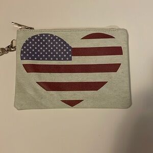 Small heart/flag clutch-wristlet.